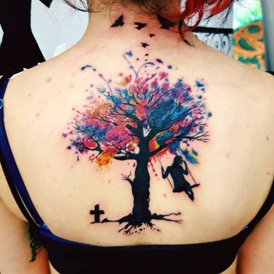 1 TOP 1 Really Beautiful Tattoos Women Tree of Life in Watercolor with birds woman in cross hammock
