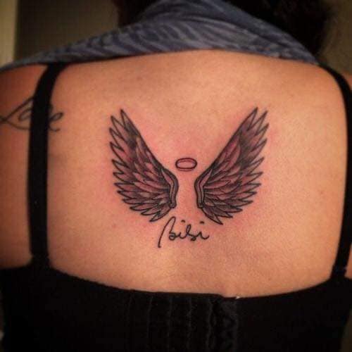 65 tatuagens de asas de anjo sob o pescoço na omoplata com nome de coroa e bisi