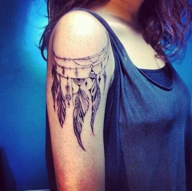 35 Tattoos on the Shoulder feathers of tribal ornaments with chains