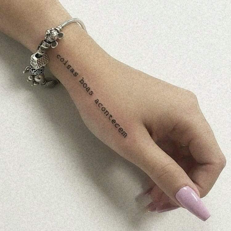 10 Tattoos of Phrases good things happen good things happen on the hand and wrist