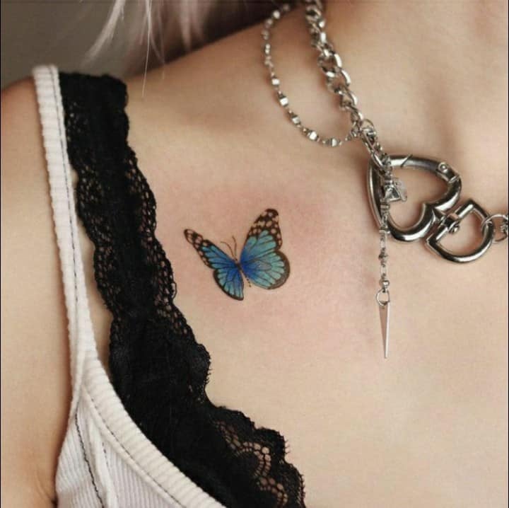 Butterfly tattoos one on clavicle