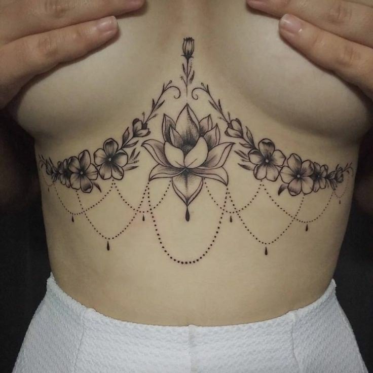1 Tattoos and a half of the Breasts Lotus Flower Flowers on branches Ornaments of black chains