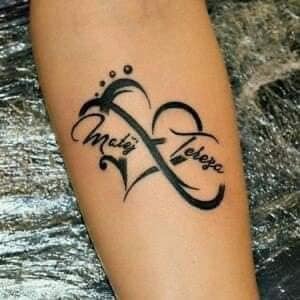 61 Beautiful Tattoos for Women Heart and Infinity with names Tereza and Matey on the forearm