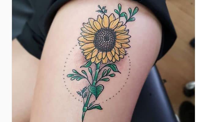 23 Sonnenblumen-Tattoos mit einem Kreis aus gepunkteten Linien hinter grünen Blättern