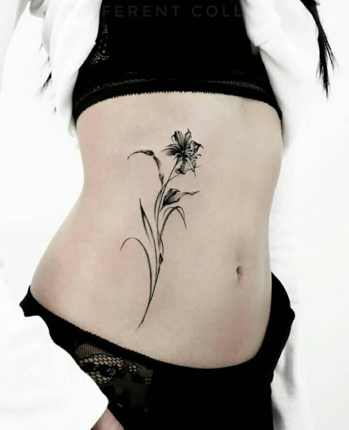 125 Tatouages sur l'abdomen Fleur noire avec tige et feuilles noires