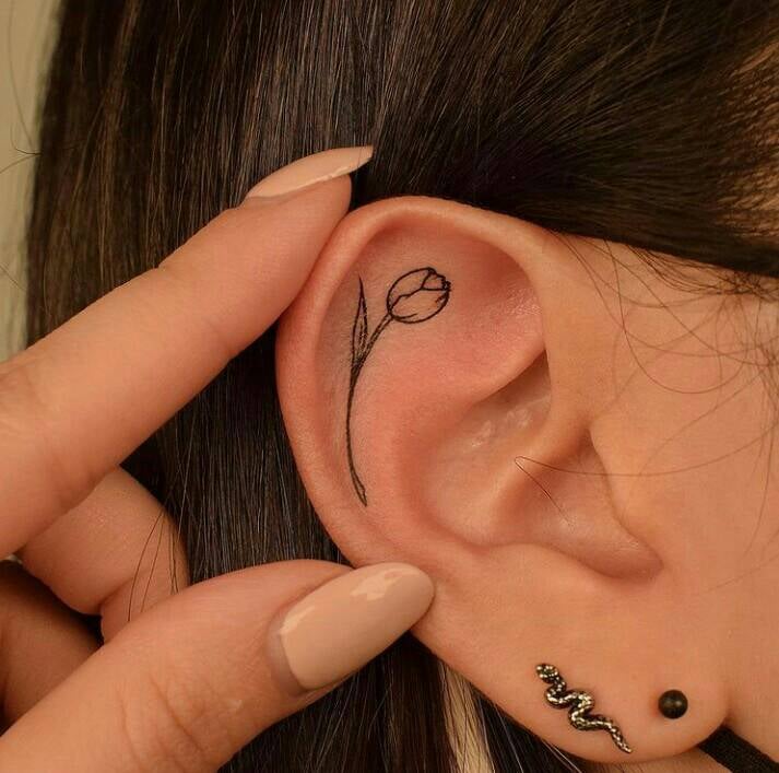 171 Delicate small Black Tulipan tattoos on the inside of the ear