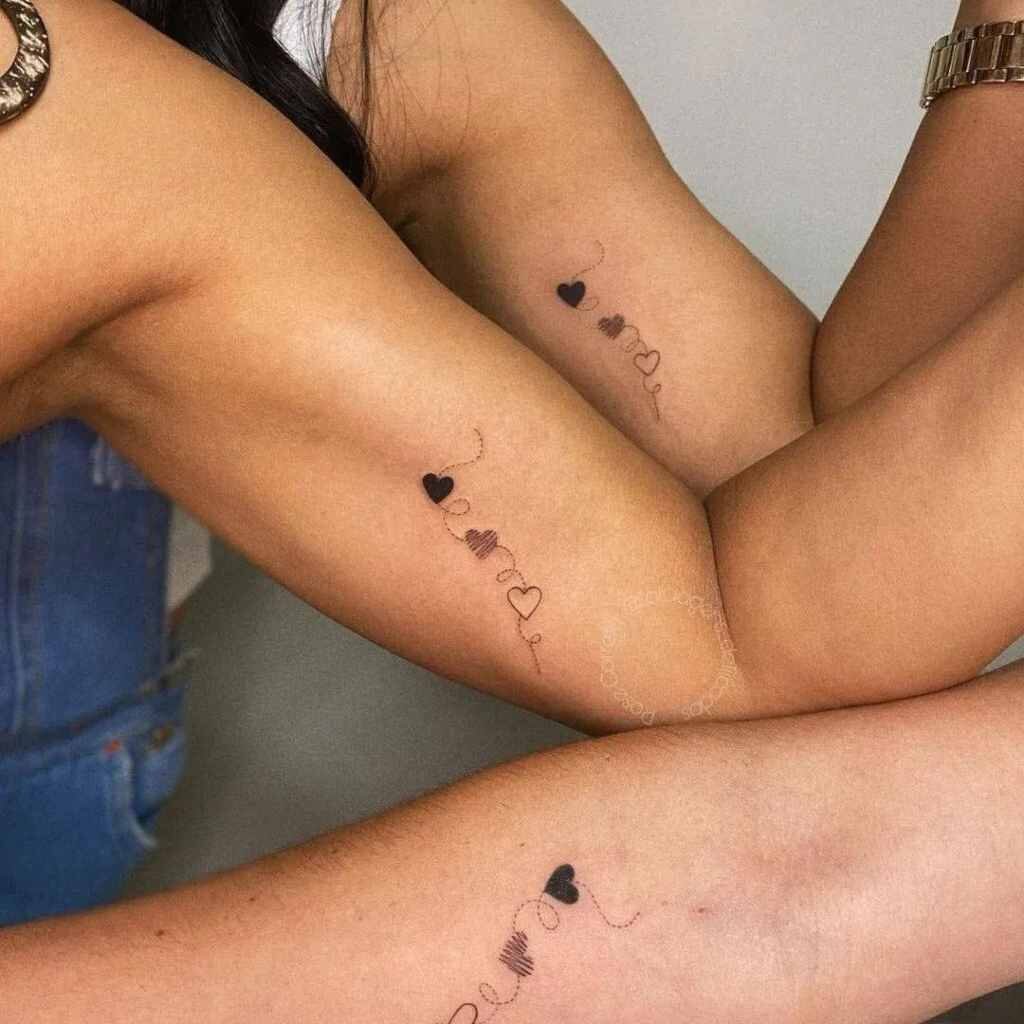 33 Tattoos for Three friends or sisters or cousins intertwined hearts by thread of dotted line
