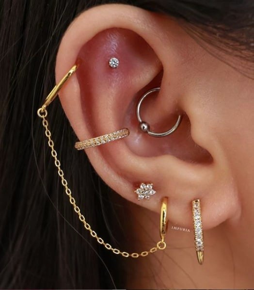115 Piercings in the Ear hoops attached with chains