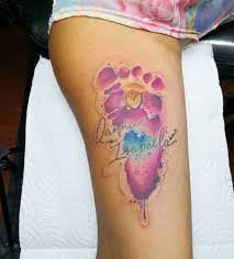 12 Tattoos of Baby Feet in light blue pink violet color