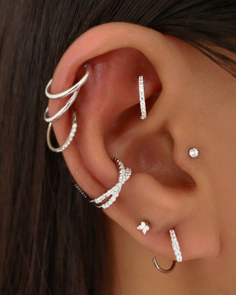 141 Piercings in the Ear silver hoops with diamonds