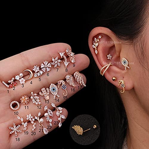 1600 Ear Piercings set of 23 accessories and shapes in gold and shiny hippocampus captus