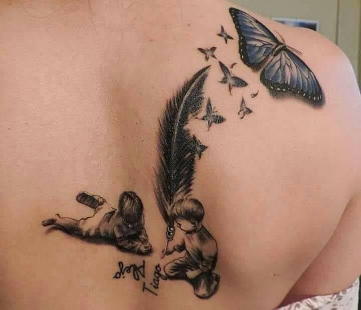 1 TOP 1 Tattoo Back Woman two children writing with feather and blue butterfly names Tiago and Alejo