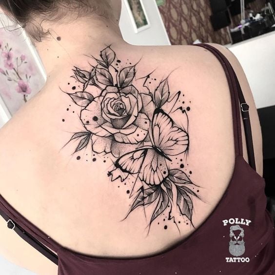 144 Tatuajes en la Espalda Contorno de Flores negras con Hojas Negras en medio de los omoplatos