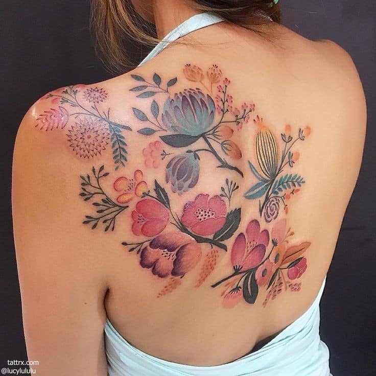 3 TOP 3 Tatuajes Espalda Mujer Hermosos Bellisimo Motivo Natural de Flores Ramas Semillas Colores naranjas rosados azules hojas en toda la espalda alta