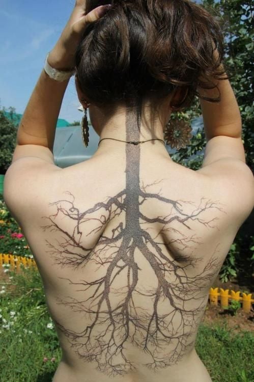47 Tattoos on the Back of a Woman Inverted Tree with roots or cup but without leaves