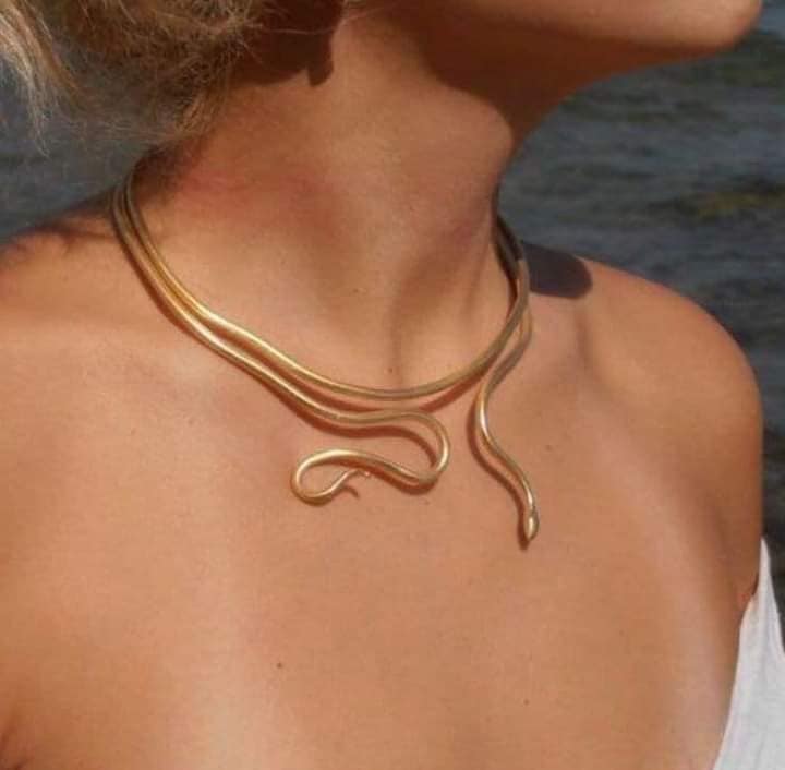 Fine golden snake necklace with two turns