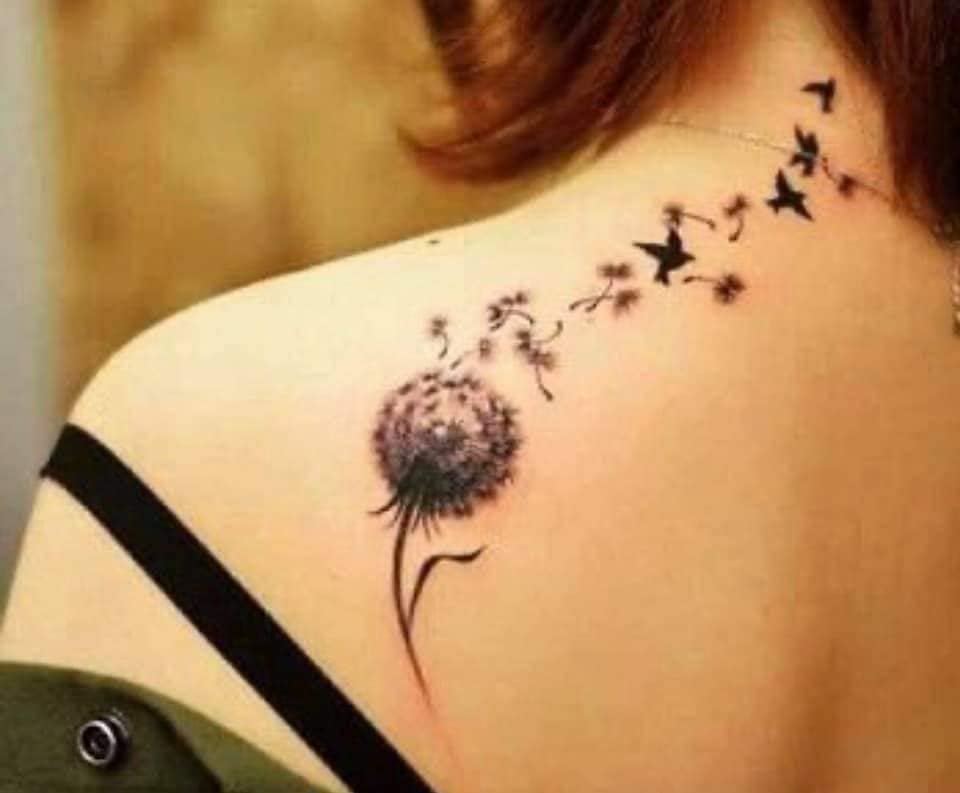 Most liked Women's tattoos dandelion on shoulder blade and seeds and birds flying towards the neck and nape