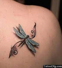 Dragonfly tattoos with 3d shadow on shoulder blade