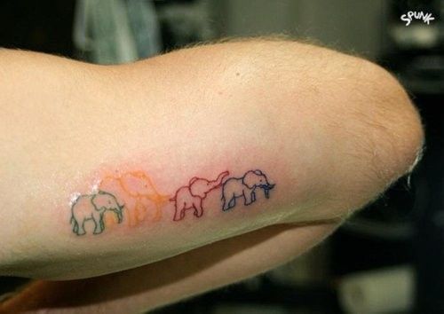 Tattoos for Mothers Children Madree elephant in yellow three children elephants in green red and blue on forearm