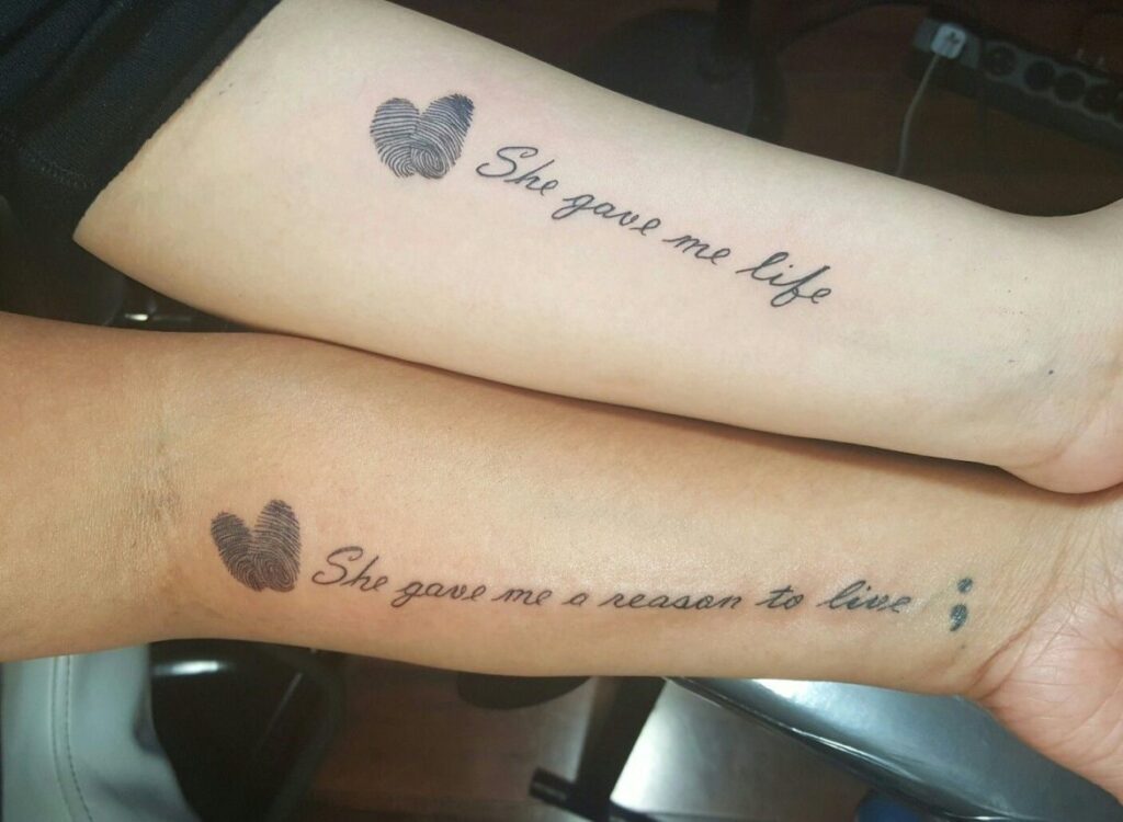Tattoos for Mothers Children and Forearm of mother and daughter with the phrases Family She gone me life She gone me a reason to live She went my life she was a reason to live and semicolon