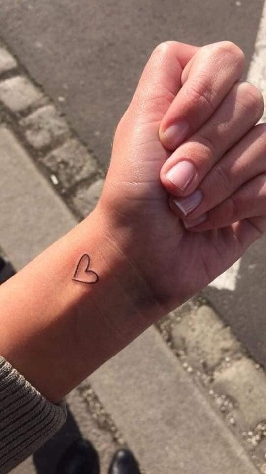 103 Simple Cute and Aesthetic Tattoos Outline of heart on wrist