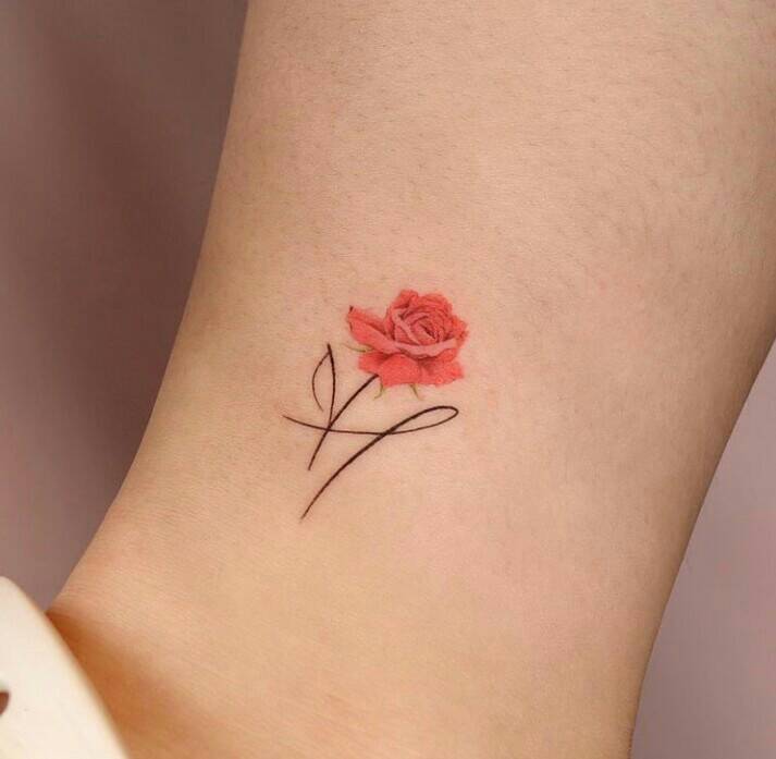 13 Delicate Tattoos handwritten letters with small rose