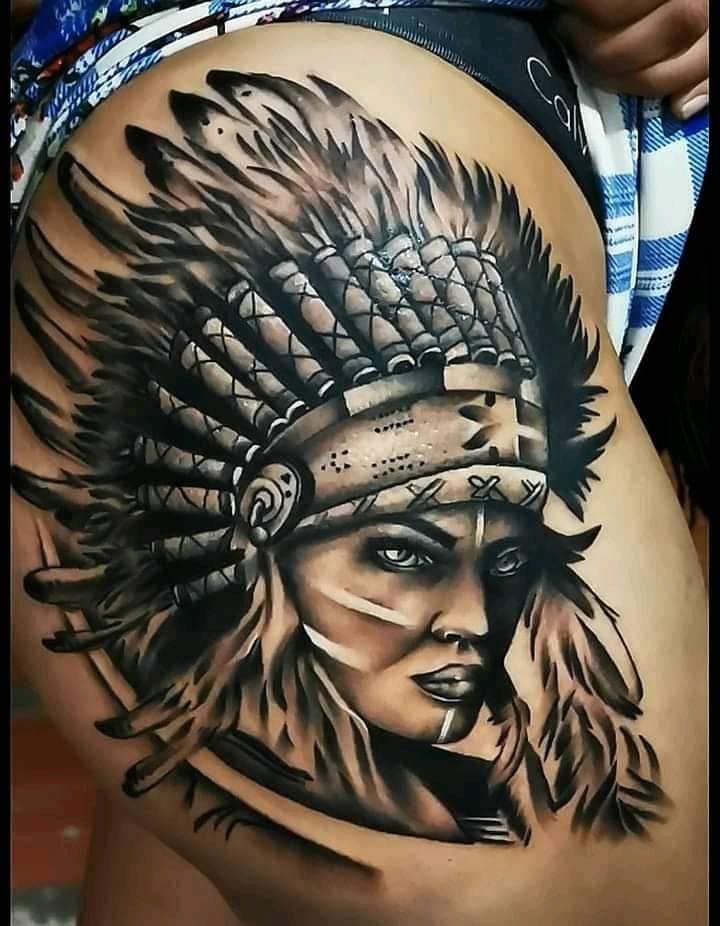 13 Most liked Women's Tattoos July part 2 Cacique Indian Hair with Black Feathers on thigh