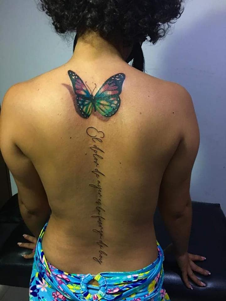 14 Most liked Women's Tattoos July part 2 Large 3D butterfly on the back and by the column Phrase