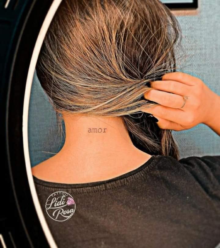 16 Tattoo of Wings Word love on the nape of the neck