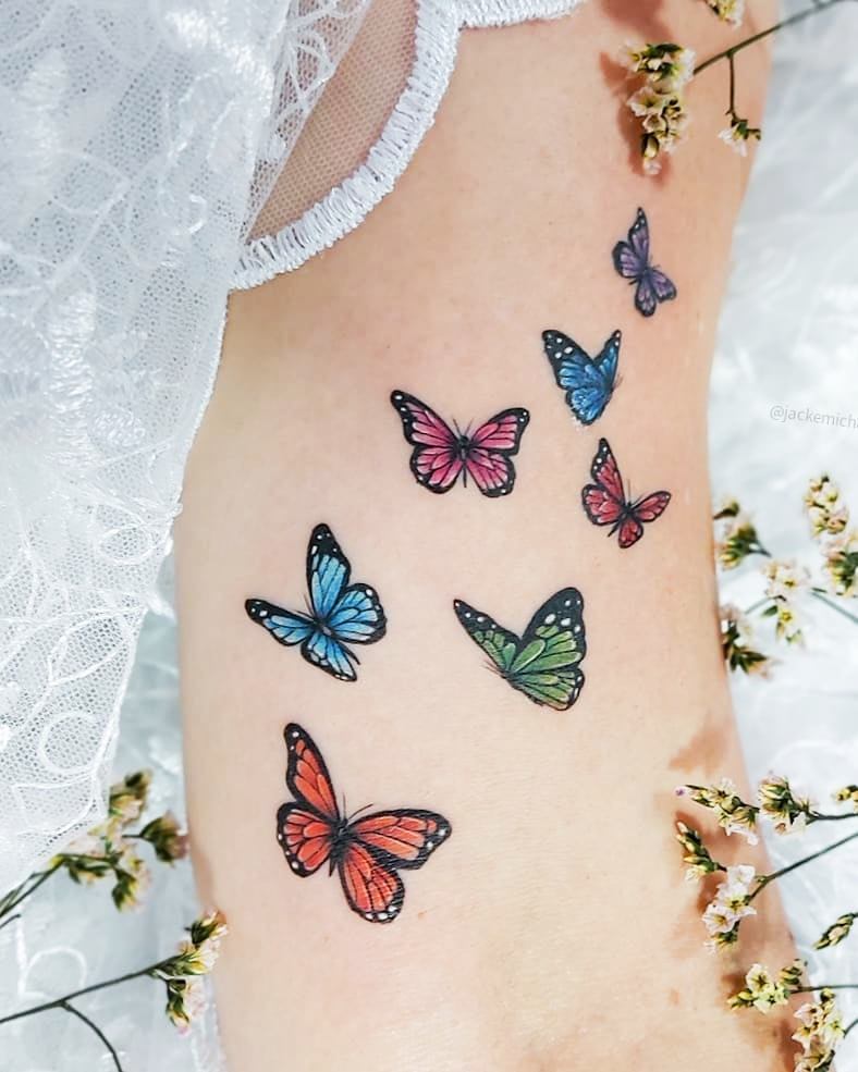3 TOP 3 Artist Jacke Michaelsen BR Tattoos Seven Emperor Butterflies of different colors and sizes