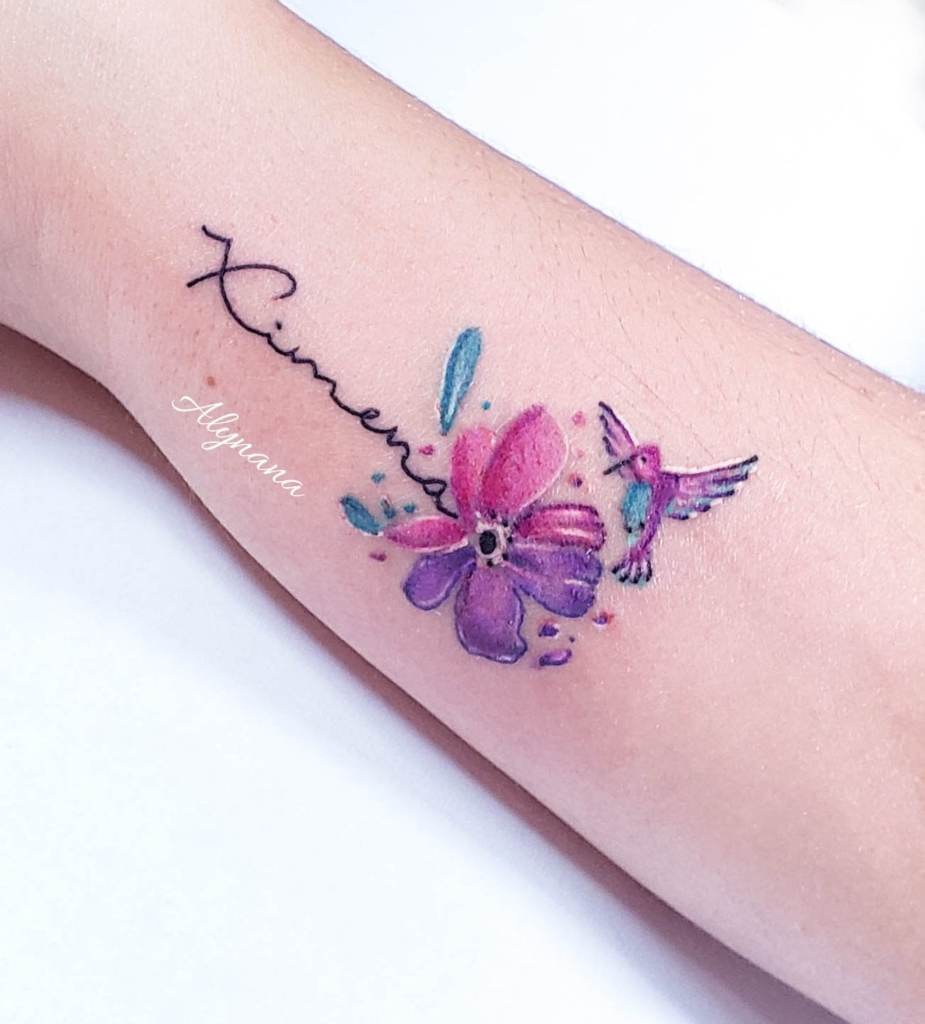 31 Alynana Tattoo Studio CDMX Violet Flower with Ximena Name and Hummingbird on forearm