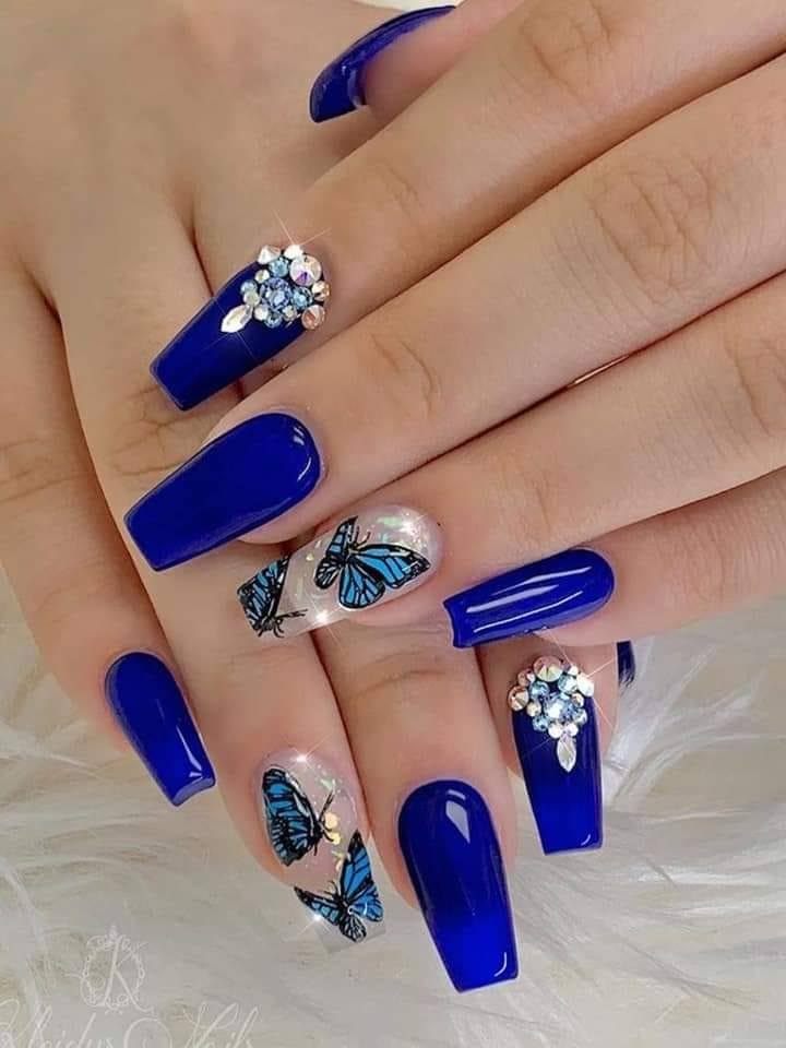 31 Long Blue Nails with semi-transparent rhinestones and butterflies