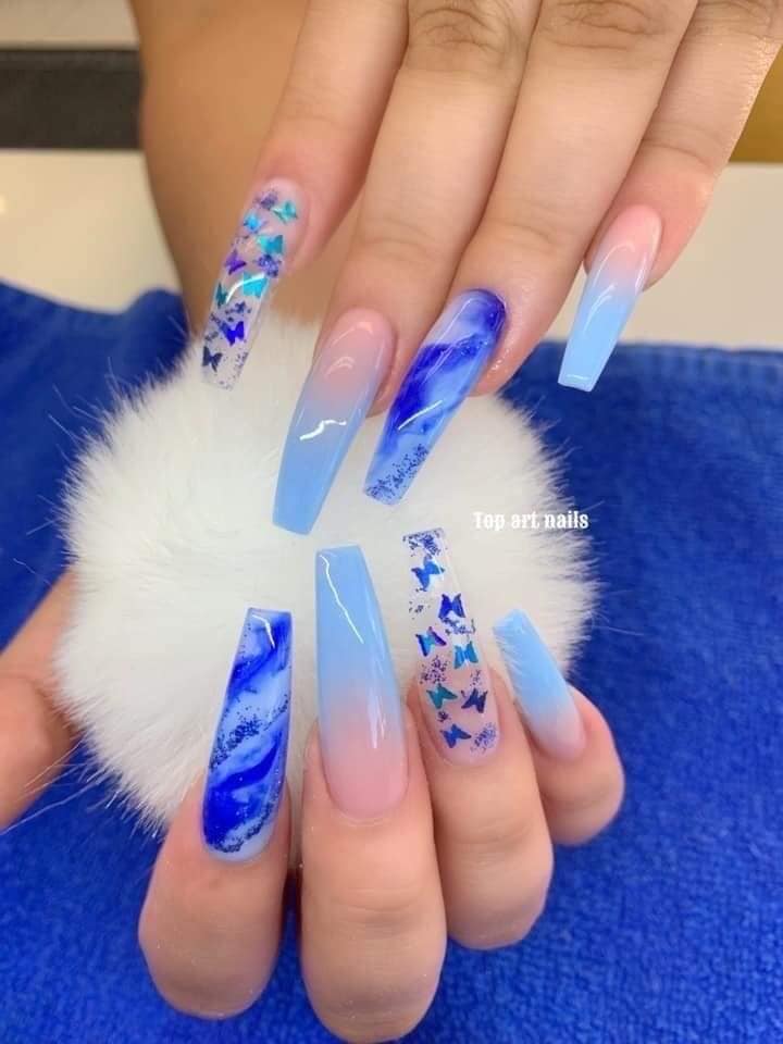 4 TOP 4 Long Blue Acrylic Nails and straight tip in light blue marbled with small butterflies