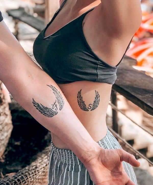 5 TOP 5 Tattoos for Couples of Characters and more Angel Wings on ribs and forearm with two initial letters F and S