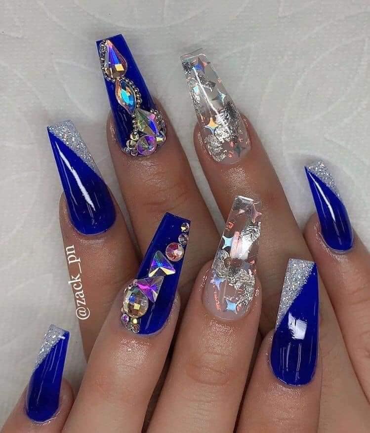 6 Royal Blue Nails with large rhinestones in the shape of transparent diamond-shaped triangles with silver encapsulation