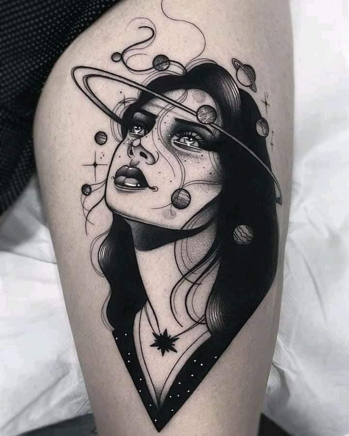 8 Most liked Women's Tattoos July part 2 Woman of the Astros Realistic Face in black with Planets Star necklace