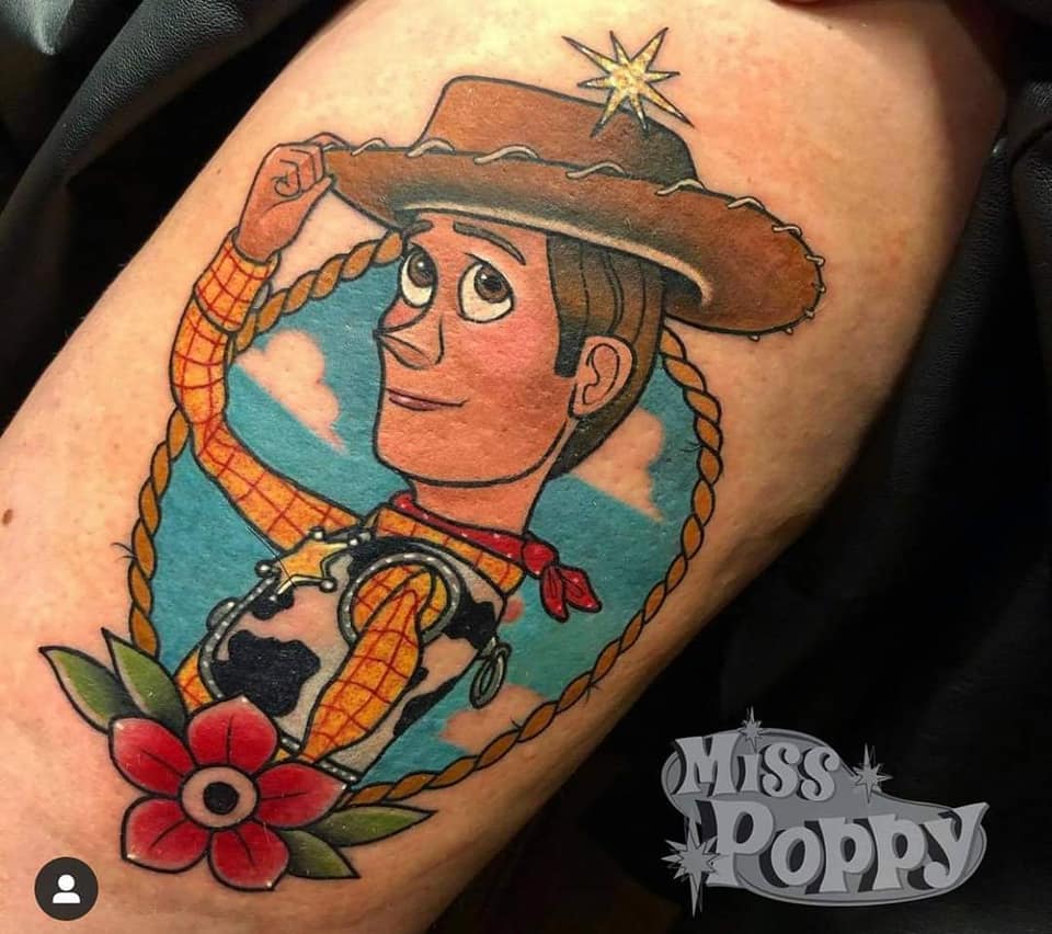 Miss Poppys Disney Happy Tattoos Sherif Woody from Toy Story with red flower rope bow star