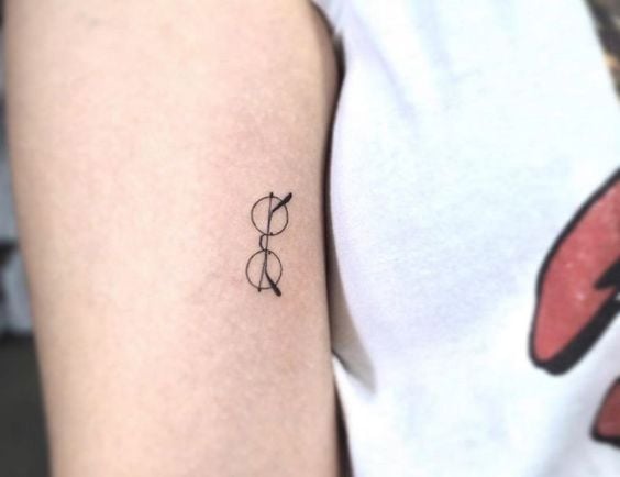 Simple Cute and Aesthetic Tattoos small glasses on arm
