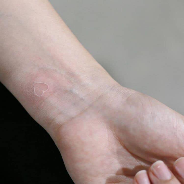 Tattoos with white ink Minimalist Heart on Wrist