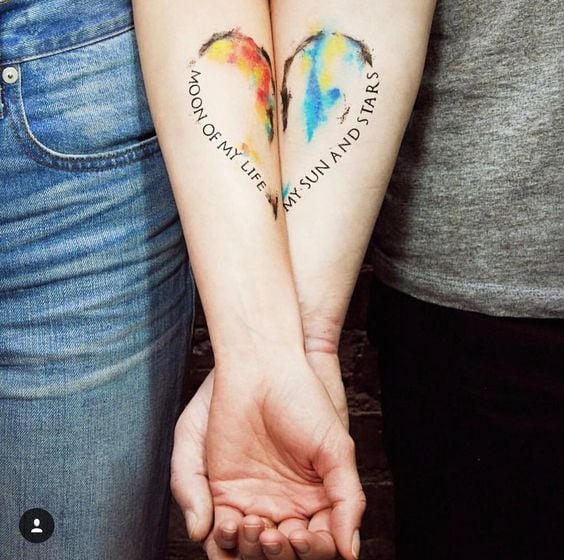 Tattoos of Hearts for Couples Sisters Friends on forearms half heart each one in watercolor with the inscriptions Moon OF MY LIFE Moon of my life MY SUM AND STARS my dream and stars