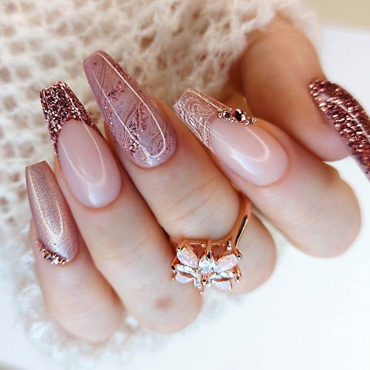 Some Pink Acrylic Nails with golden tips, small golden strass