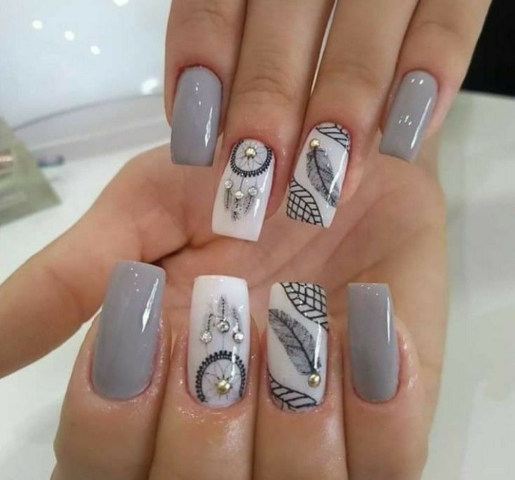 1 TOP 1 Gray decorated nails Design with Small Dreamcatchers and bright stones feather white background