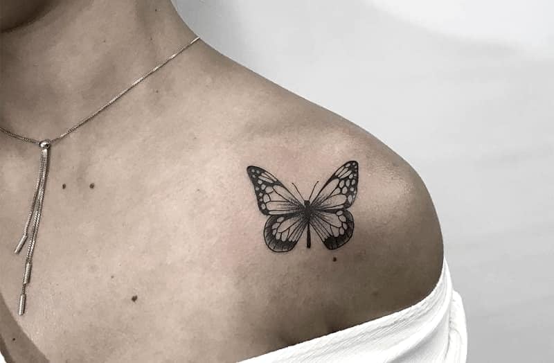 14 Butterfly Tattoos on Black Shoulder