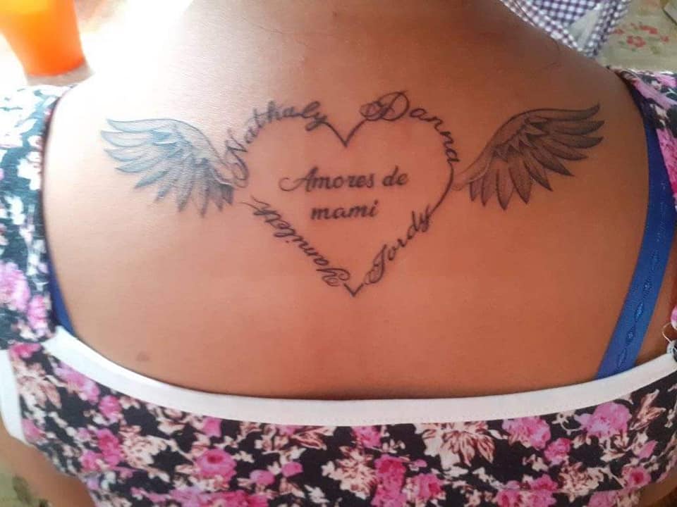 25 Tattoos for women the most liked angel wings on shoulder blade inscription Mommy's love names Nathaly Darra Yamilet Jordy forming a heart