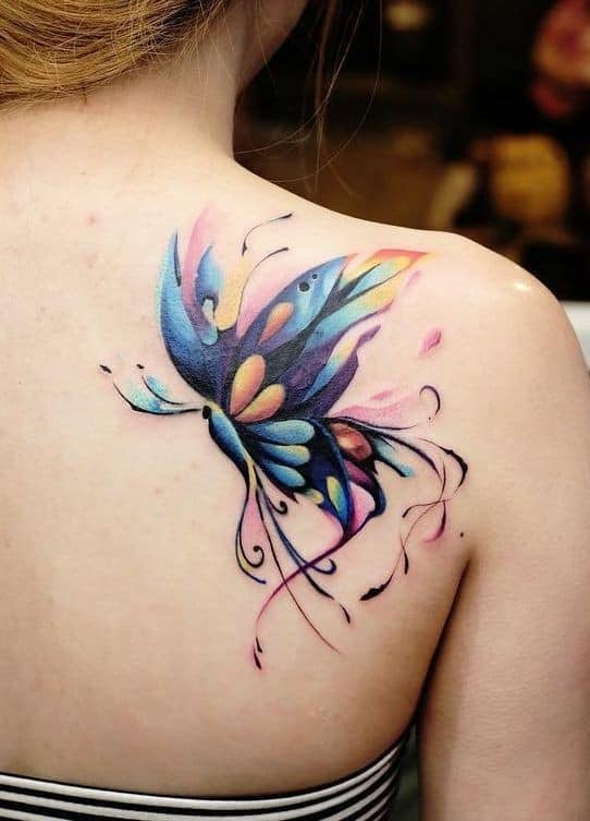 38 Watercolor Butterfly in profile in watercolor with many colors on the shoulder blade violet yellow orange blue purple