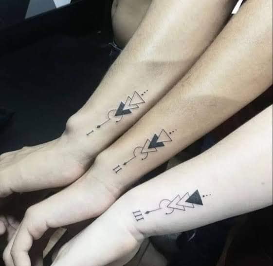 8 Tattoos for best friends triangular geometric symbols and circles Roman numerals on the forearm