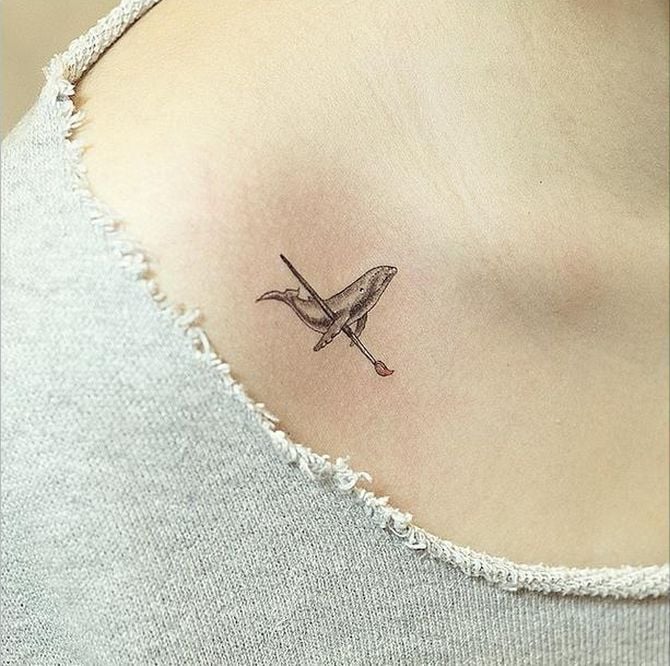 Small Whale Tattoos with Brush on clavicle