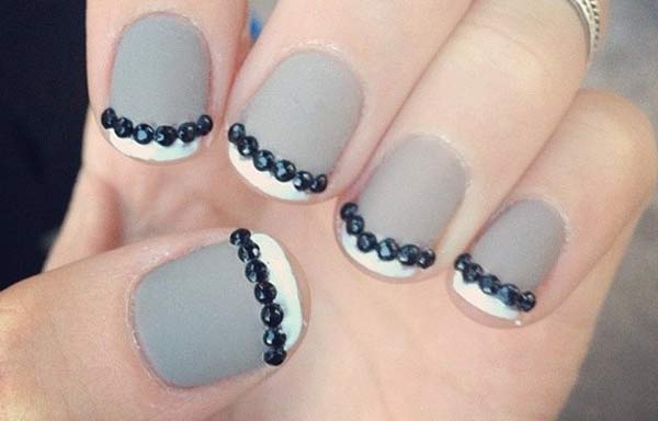 Some decorated gray with white at the tip and small black stones