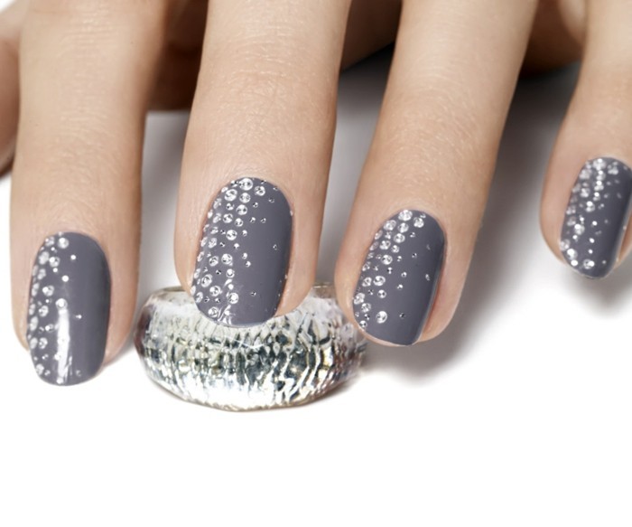 Some decorated gray with small shiny stones in different sizes
