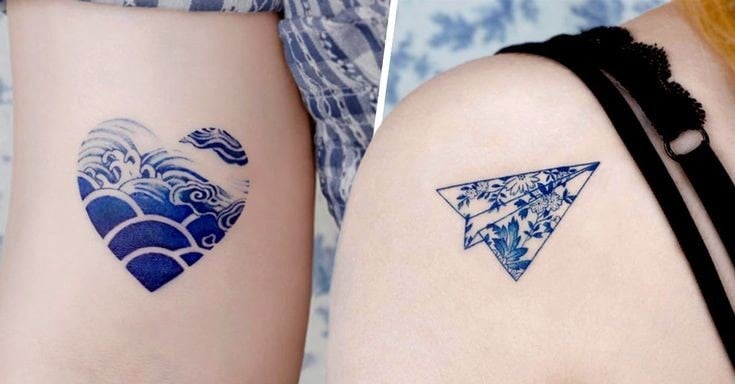 13 blaue Herz-Tattoos mit Meereswellen-Papierflieger
